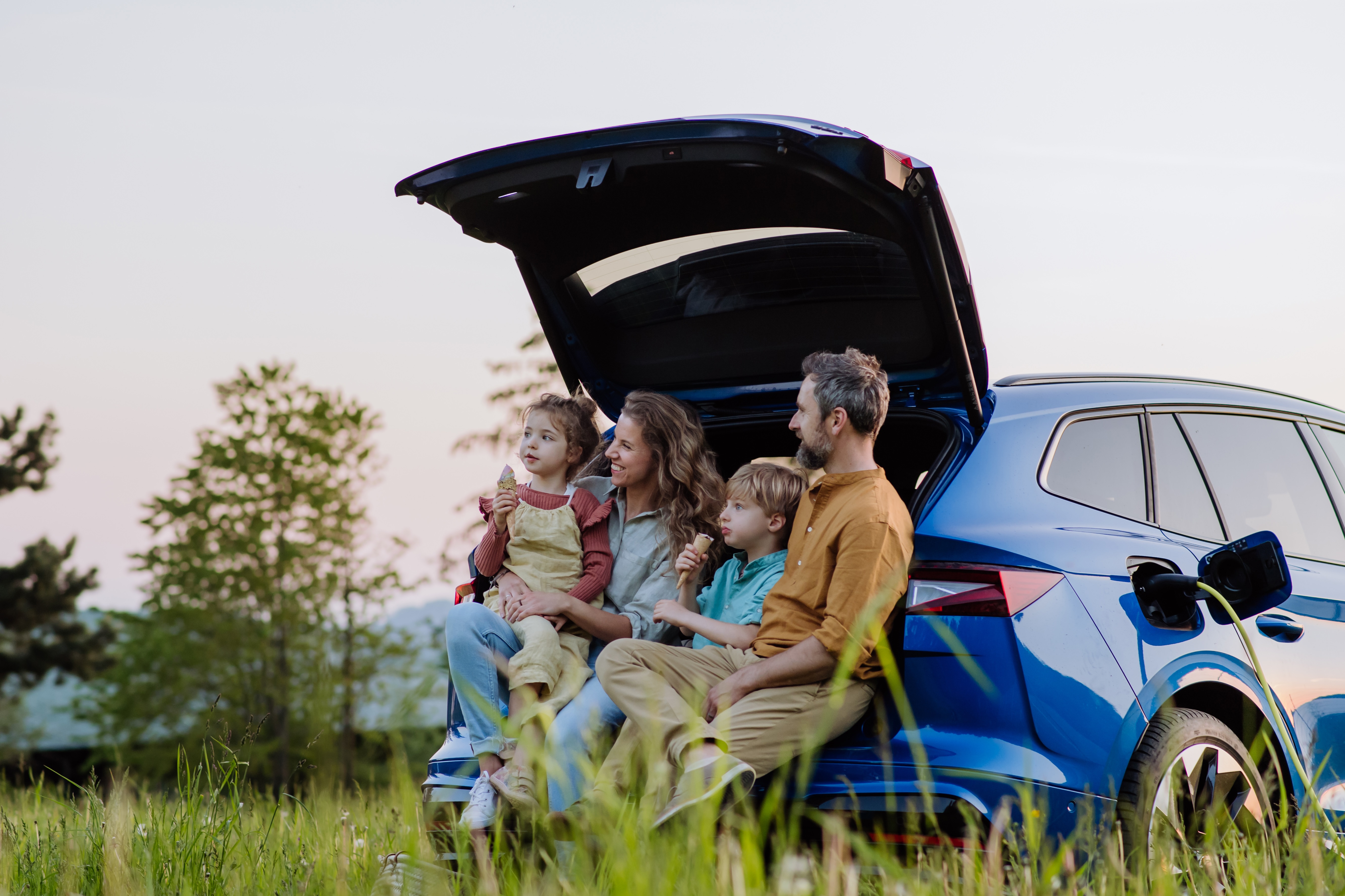 family in car