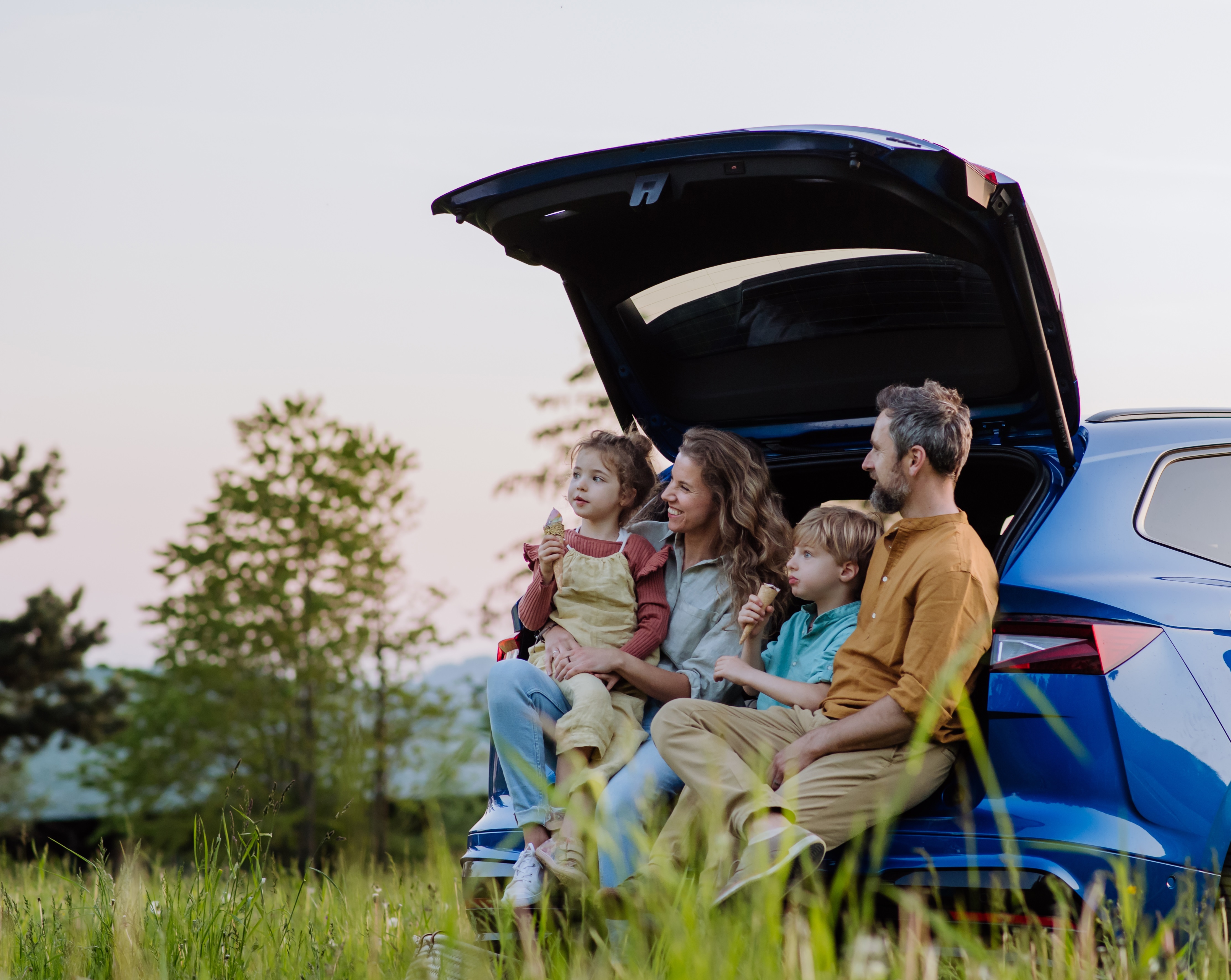 family in car
